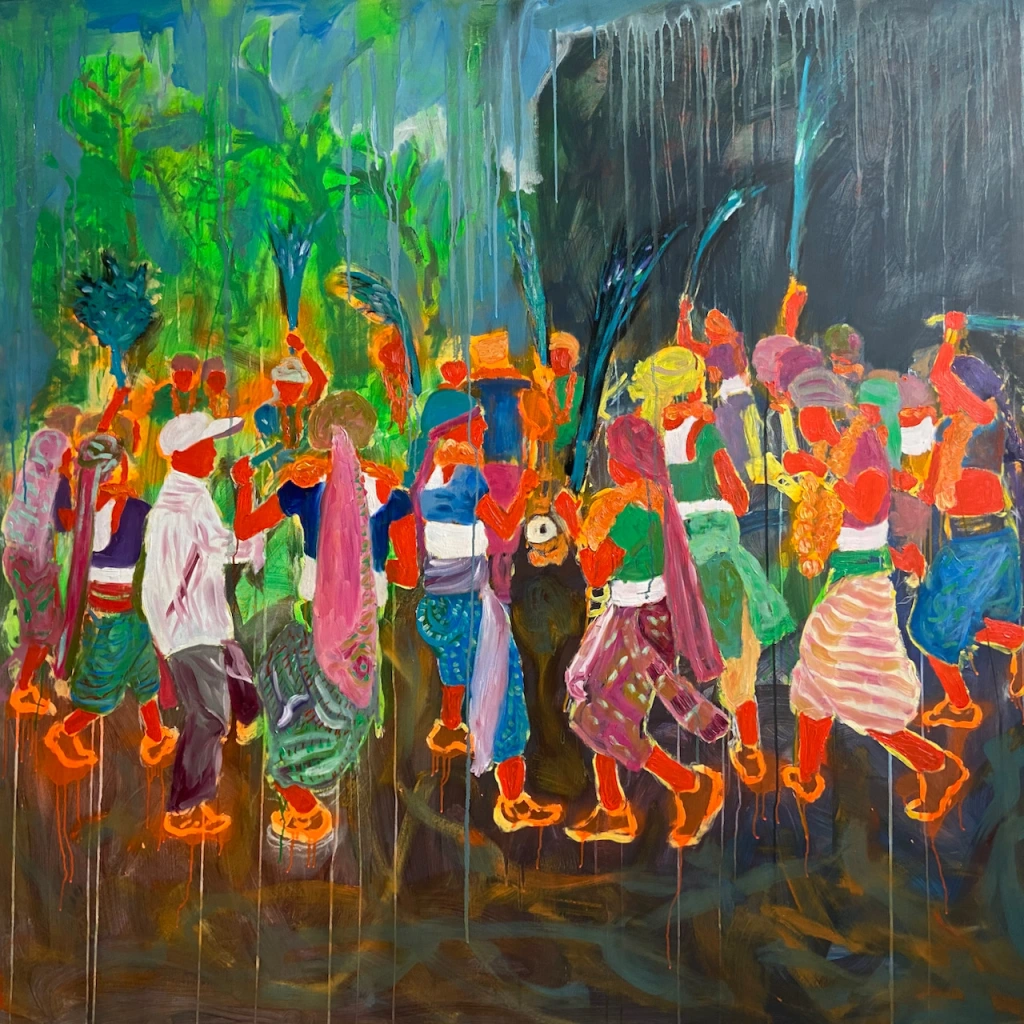 Painting by Ashokkumar Mistry (AKA Ashok Mistry). A loosely painted group of people dancing all of whom are dressed in colourful clothes and turbans. The faces and arms of everyone are painted flatly in a scarlet colour. the abstract background is green and blue on the top left, mid great on the right and earthy brown, orange and black below. the can cutters all hold bunches of peacock feathers.all of the can cutters war bright yellow and arrange garlands and neon orange trainers shown in outline. one figure on the left of the painting is dresses in a conventional white shirt, black trousers and a white cap.